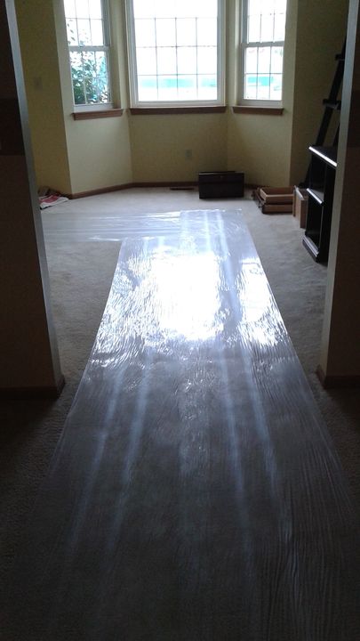 Hallway floor covered with a protective runner (Full Service Moving) by Affordable Moving Solutions of Ohio