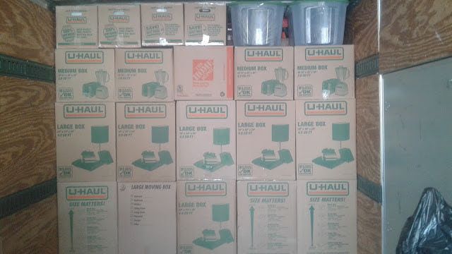 Moving boxes stacked inside a truck (Full Service Moving) by Affordable Moving Solutions of Ohio
