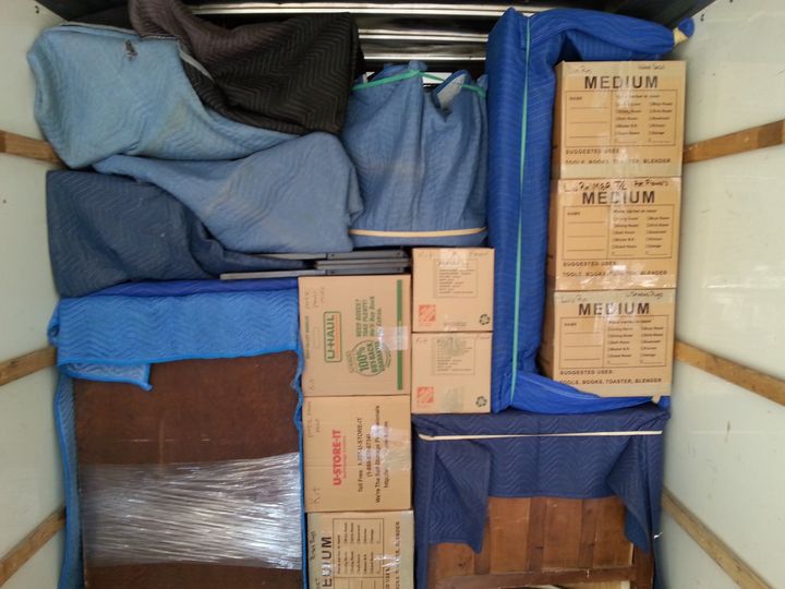 Moving truck packed with boxes and padded furniture (Full Service Moving) by Affordable Moving Solutions of Ohio