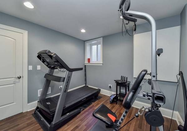 Home gym with treadmill and exercise equipment set up (Pickup and delivery) by Affordable Moving Solutions of Ohio