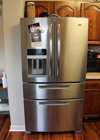 Stainless French-door refrigerator installed in a kitchen (Pickup and delivery services) by Affordable Moving Solutions of Ohio