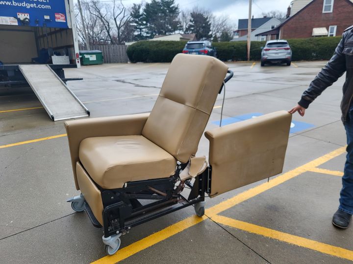 Lift recliner chair being delivered on a cart (Pickup and Delivery Services) by Affordable Moving Solutions of Ohio