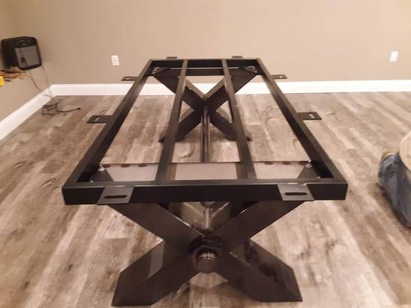 Pool table base frame being reassembled (Pool Table Moving Services) by Affordable Moving Solutions of Ohio