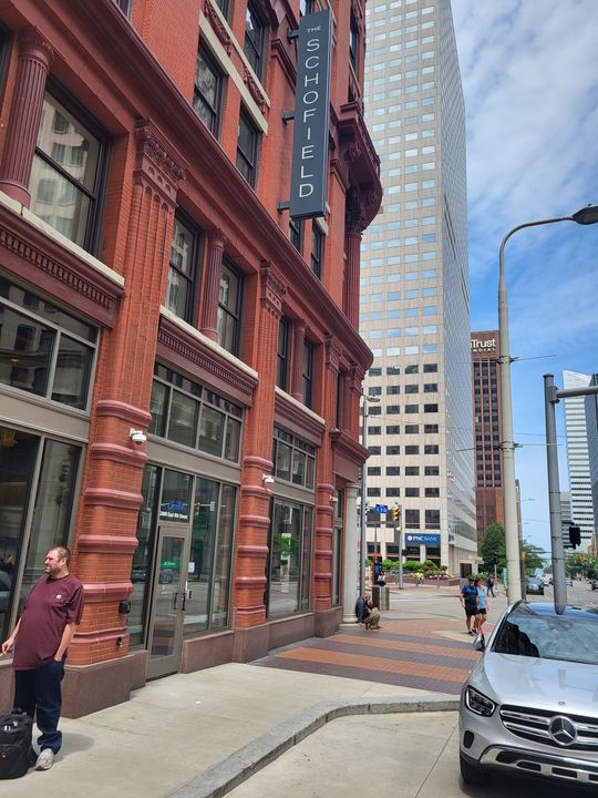 Historic red-brick building downtown ((no own label; sits before a Drive chip and the label Senior Moving Services; placed on Senior Moving per Mike 2026-10-18 4:55 PM)) by Affordable Moving Solutions of Ohio